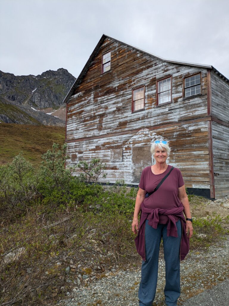 Theresa in front of the cook house